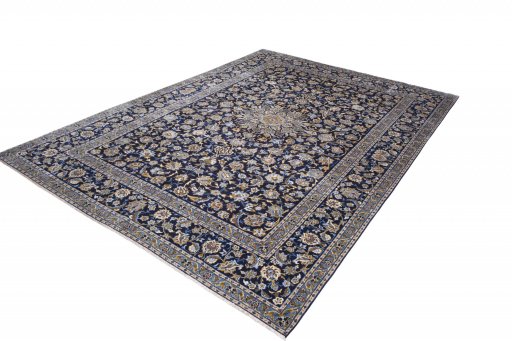 Corner detail of 2000s Kashan rug showing border pattern and Wool pile