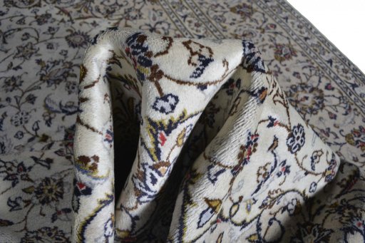 Surface texture of 2000s Kashan rug with natural Wool and intricate pattern