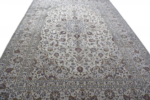 Surface texture of 2000s Kashan rug with natural Wool and intricate pattern