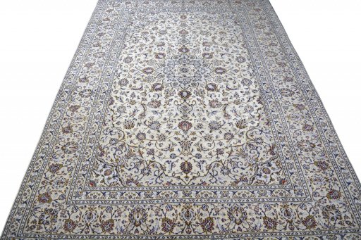 Surface texture of 2000s Kashan rug with natural Wool and intricate pattern