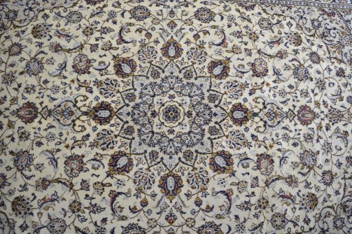 Central medallion detail of 2000s Kashan rug from Iran / Persia