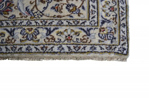Close-up detail of 2000s Kashan rug from Iran / Persia showing Wool weave
