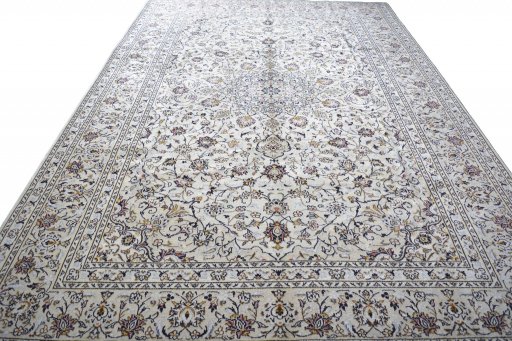 Surface texture of 2000s Kashan rug with natural Wool and intricate pattern