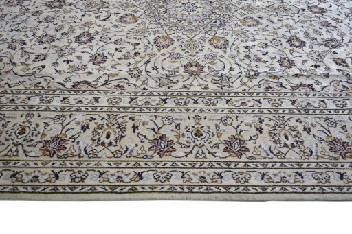 Close-up detail of 2000s Kashan rug from Iran / Persia showing Wool weave
