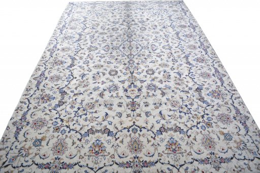 Surface texture of 2000s Kashan rug with natural Wool and intricate pattern