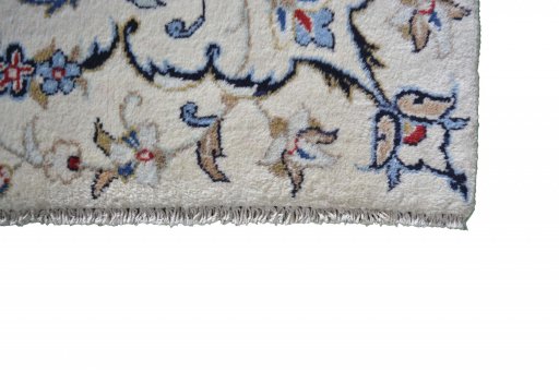 Close-up detail of 2000s Kashan rug from Iran / Persia showing Wool weave