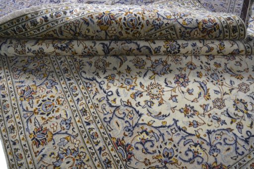 Close-up detail of 2000s Kashan rug from Iran / Persia showing Wool weave