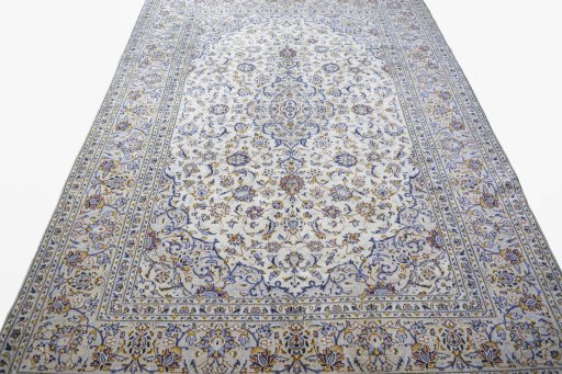 Surface texture of 2000s Kashan rug with natural Wool and intricate pattern