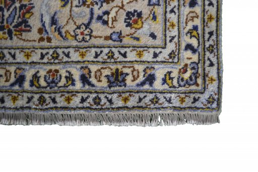 Close-up detail of 2000s Kashan rug from Iran / Persia showing Wool weave