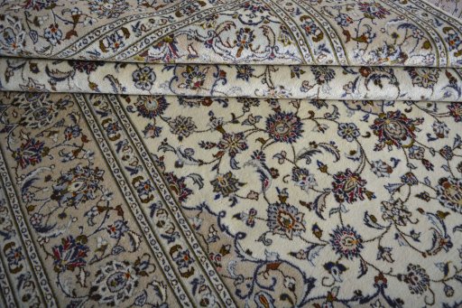 Close-up detail of 2000s Kashan rug from Iran / Persia showing Wool weave