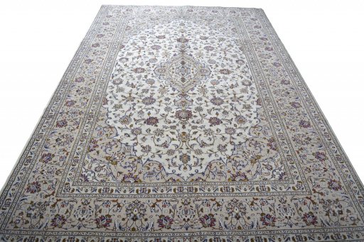 Surface texture of 2000s Kashan rug with natural Wool and intricate pattern