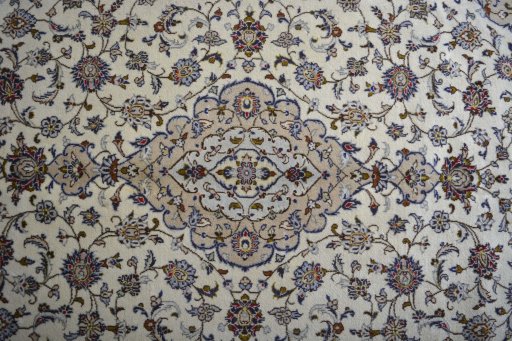 Central medallion detail of 2000s Kashan rug from Iran / Persia