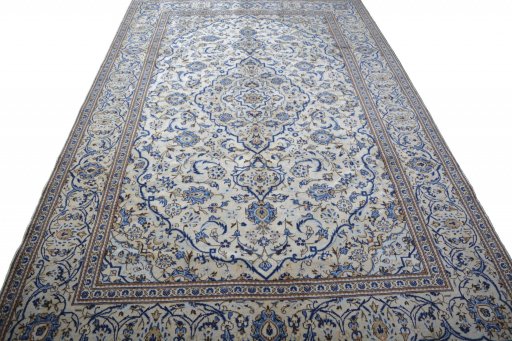 Surface texture of 2000s Kashan rug with natural Wool and intricate pattern