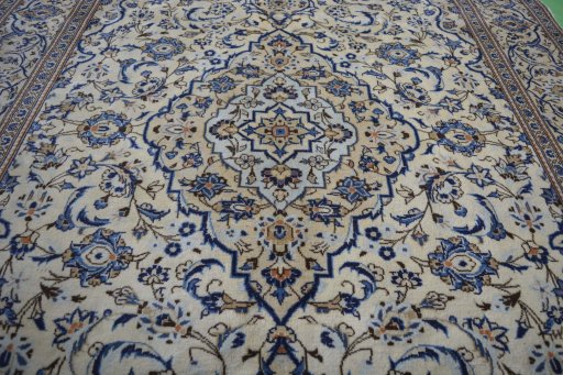 Central medallion detail of 2000s Kashan rug from Iran / Persia