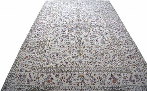 Surface texture of 2000s Kashan rug with natural Wool and intricate pattern
