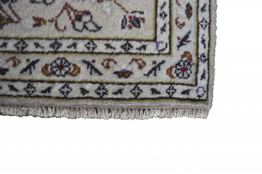 Close-up detail of 2000s Kashan rug from Iran / Persia showing Wool weave