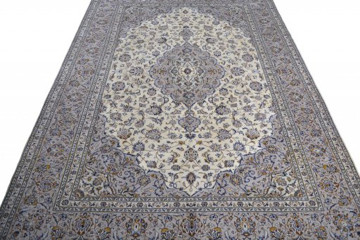 Surface texture of 2000s Kashan rug with natural Wool and intricate pattern