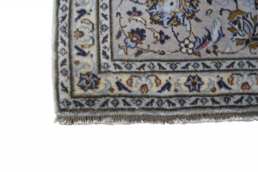 Close-up detail of 2000s Kashan rug from Iran / Persia showing Wool weave