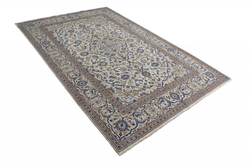 Corner detail of 2000s Kashan rug showing border pattern and Wool pile