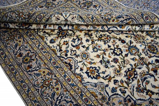 Close-up detail of 2000s Kashan rug from Iran / Persia showing Wool weave