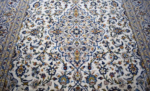 Central medallion detail of 2000s Kashan rug from Iran / Persia