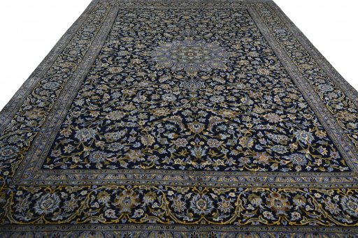 Surface texture of 2000s Kashan rug with natural Wool and intricate pattern