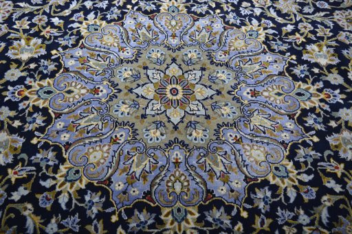 Central medallion detail of 2000s Kashan rug from Iran / Persia