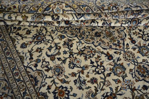 Close-up detail of 2000s Kashan rug from Iran / Persia showing Wool weave