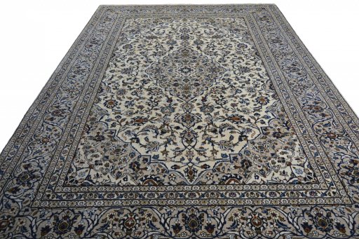 Surface texture of 2000s Kashan rug with natural Wool and intricate pattern