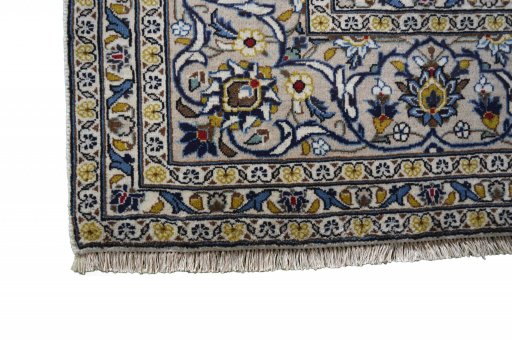 Close-up detail of 2000s Kashan rug from Iran / Persia showing Wool weave