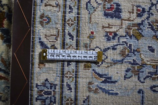 Close-up detail of 2000s Kashan rug from Iran / Persia showing Wool weave