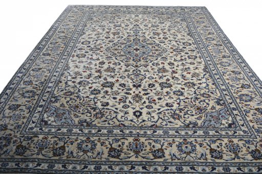 Surface texture of 2000s Kashan rug with natural Wool and intricate pattern