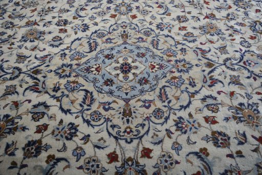 Central medallion detail of 2000s Kashan rug from Iran / Persia