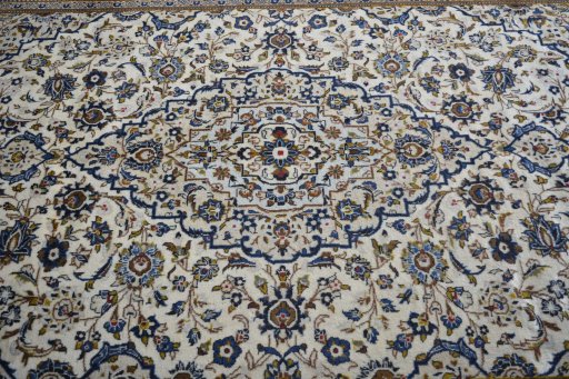 Central medallion detail of 2000s Kashan rug from Iran / Persia