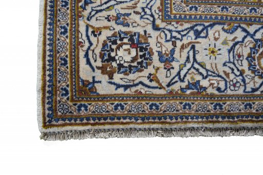 Close-up detail of 2000s Kashan rug from Iran / Persia showing Wool weave