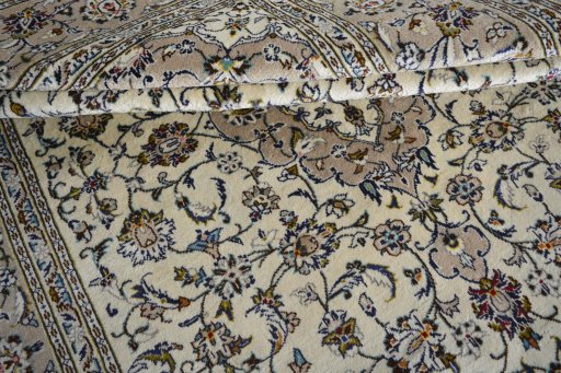 Close-up detail of 2000s Kashan rug from Iran / Persia showing Wool weave