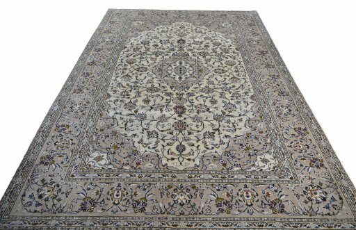 Surface texture of 2000s Kashan rug with natural Wool and intricate pattern