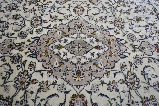 Central medallion detail of 2000s Kashan rug from Iran / Persia