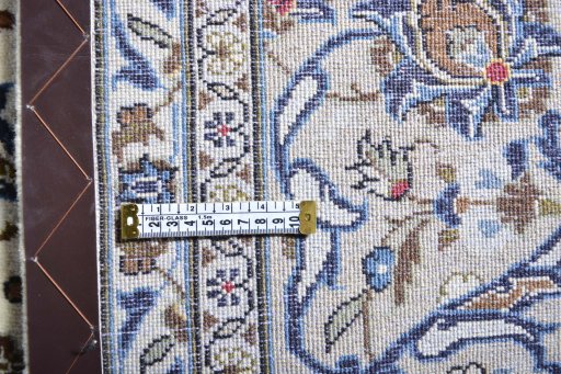 Surface texture of 2000s Kashan rug with natural Wool and intricate pattern