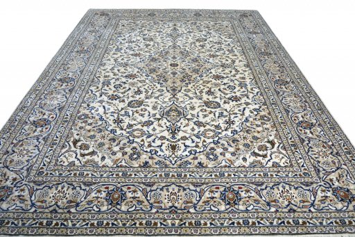 Surface texture of 2000s Kashan rug with natural Wool and intricate pattern