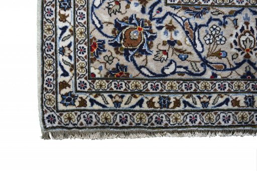Close-up detail of 2000s Kashan rug from Iran / Persia showing Wool weave