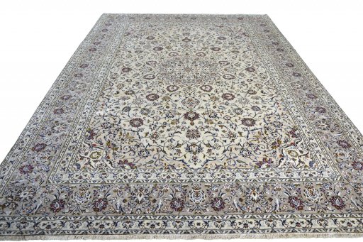 Surface texture of 2000s Kashan rug with natural Wool and intricate pattern