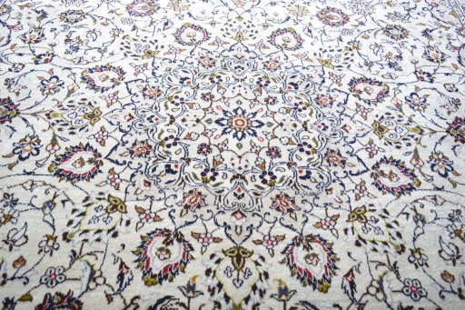 Central medallion detail of 2000s Kashan rug from Iran / Persia