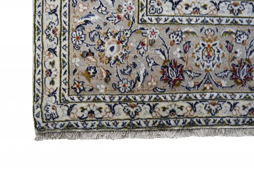 Close-up detail of 2000s Kashan rug from Iran / Persia showing Wool weave