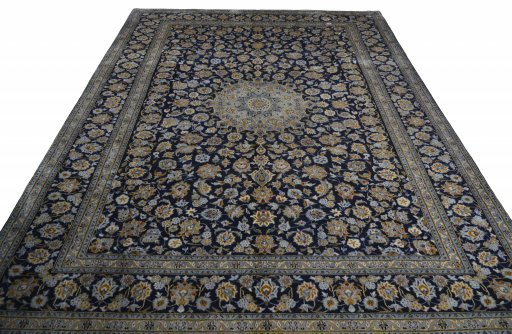 Surface texture of 2000s Kashan rug with natural Wool and intricate pattern