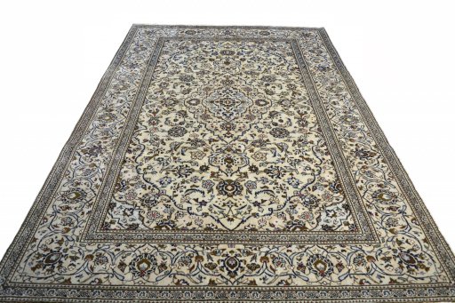 Surface texture of 2000s Kashan rug with natural Wool and intricate pattern