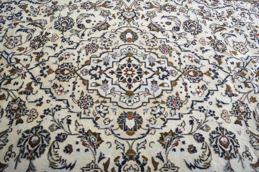 Central medallion detail of 2000s Kashan rug from Iran / Persia