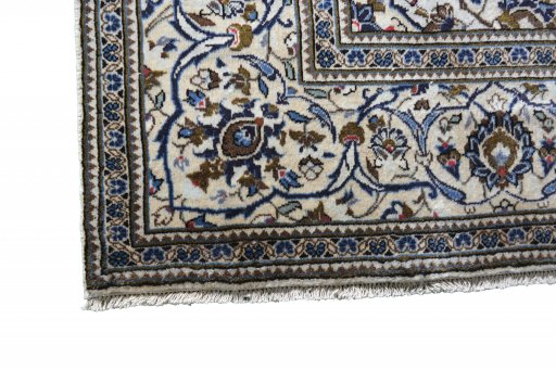 Close-up detail of 2000s Kashan rug from Iran / Persia showing Wool weave