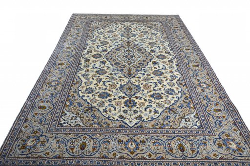 Surface texture of 2000s Kashan rug with natural Wool and intricate pattern
