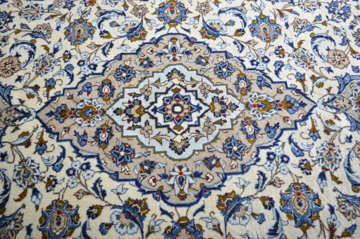 Central medallion detail of 2000s Kashan rug from Iran / Persia